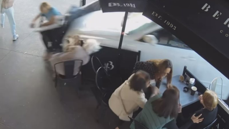 Shocking moment car ploughs into patrons at Melbourne cafe