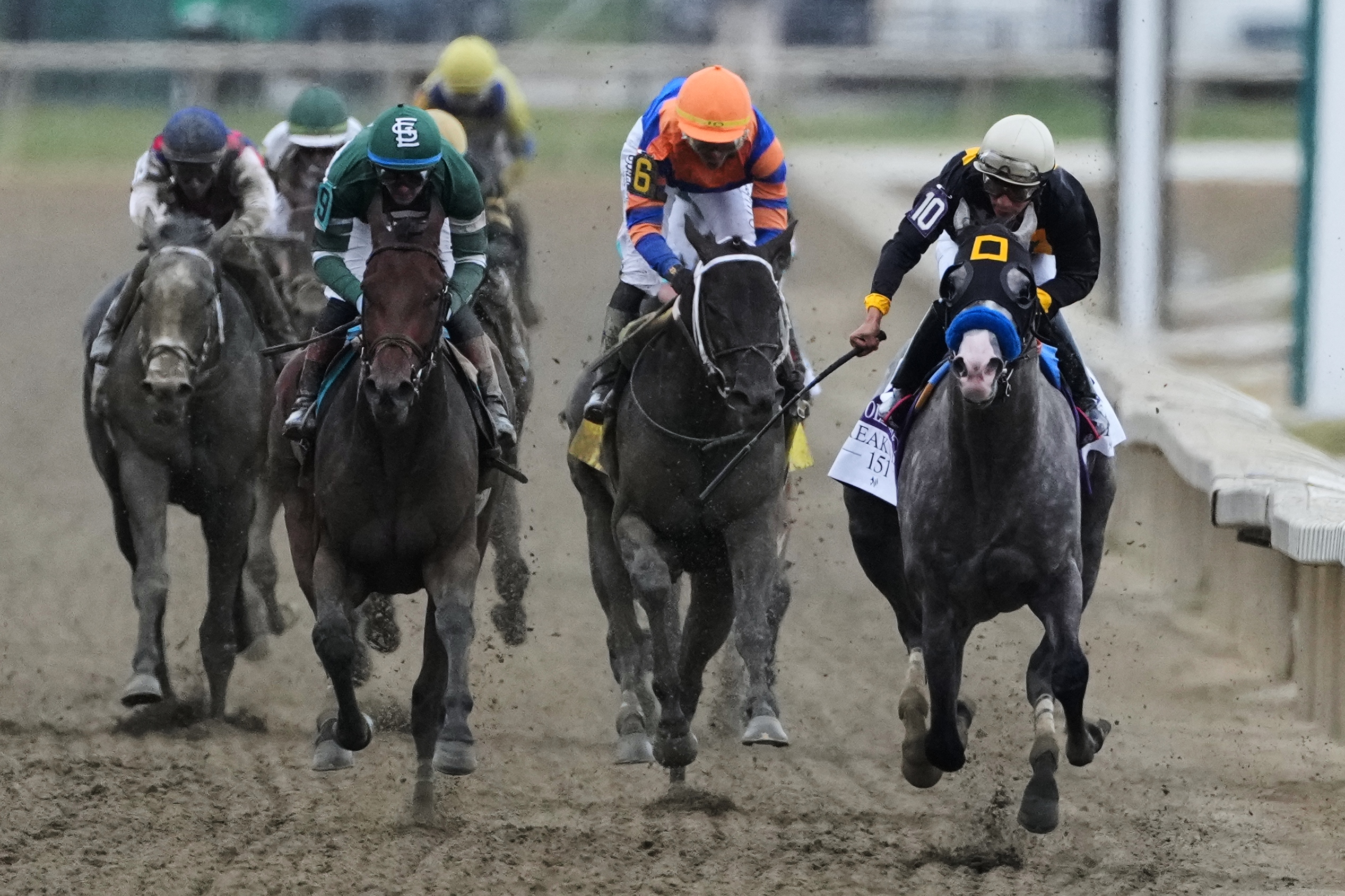 Napoleon Solo holds off Iron Honor to win the Preakness