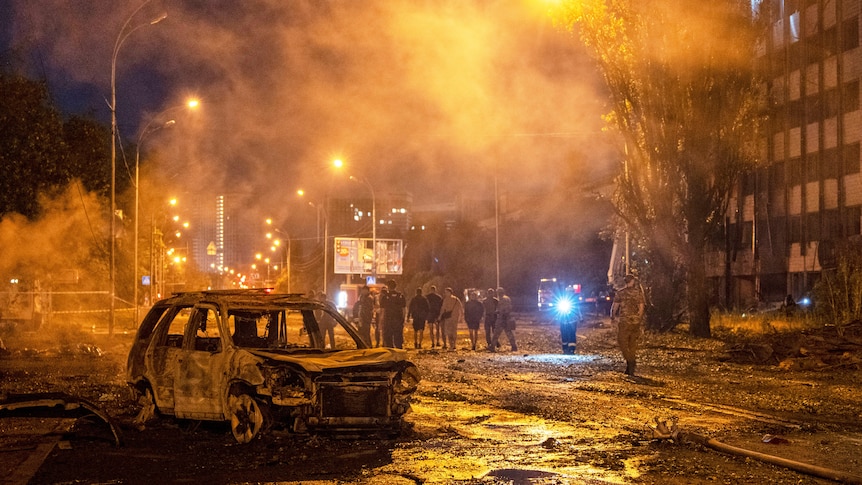 Russian missile attacks on Kyiv kill at least ten and injure dozens