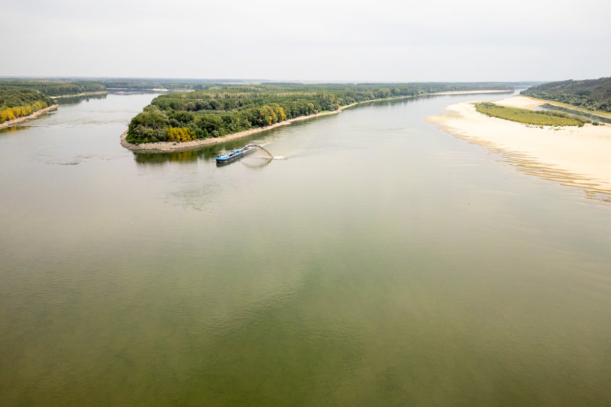 Romania rushes to sink 4 barges in the Danube to keep a nuclear power plant's second reactor running