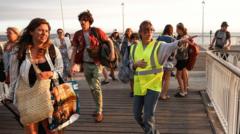 Tens of thousands evacuated from French tourist spot as wildfires spread