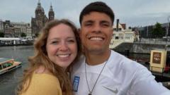 Boxer charged with killing aid worker in Greece after his wife gave police 'key' details