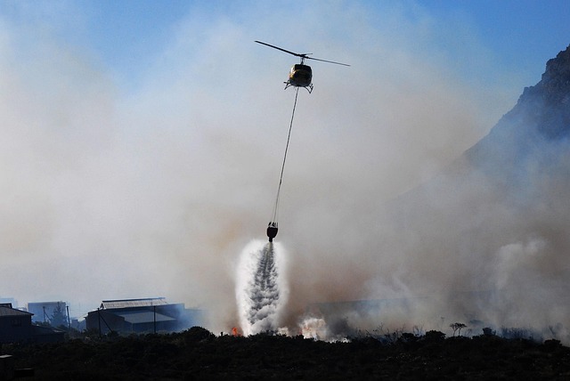 Choppers collide, killing 2, as fires and foreboding grip Greece