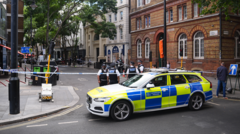 Woman charged after four stabbed near Covent Garden