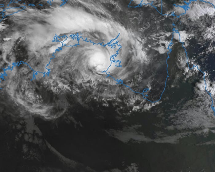 Australia news live: Tropical Cyclone Narelle crosses NT coast as category three system