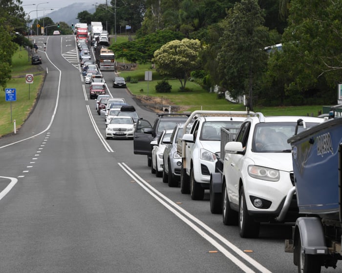 One dead and two fighting for their lives after bus rolled off road in Whitsundays region