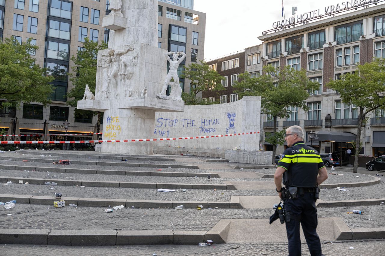 Nationaal Monument op de Dam beklad, twee mannen aangehouden