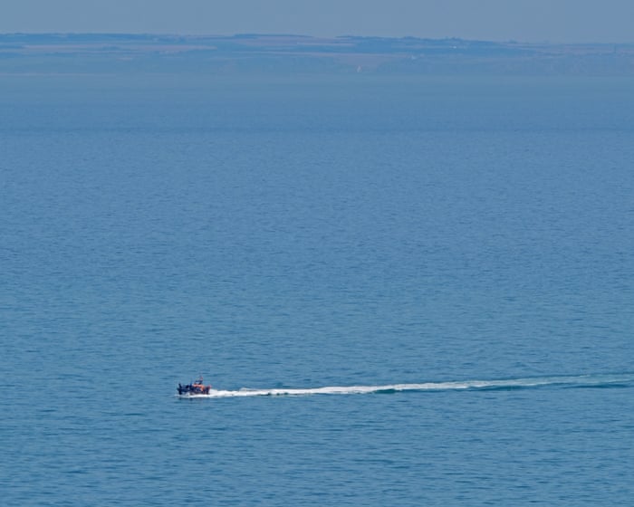 Dinghy carrying 157 people capsizes in Channel after engine catches fire