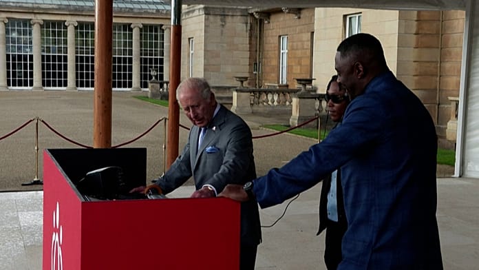 King Charles and Idris Elba share the DJ stage at royal garden party