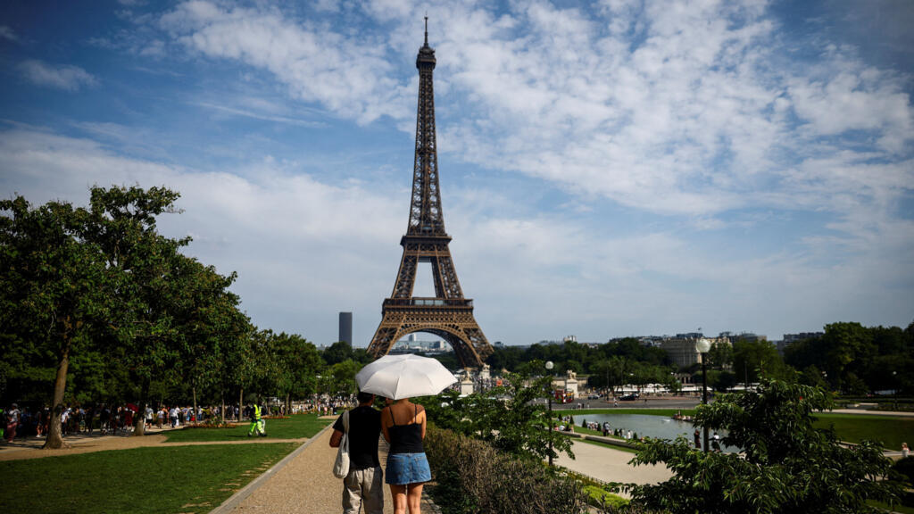 Eiffel Tower, Louvre close early as France faces third heatwave in three months
