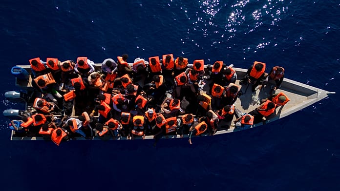 More than 70 people feared dead after migrant boat capsizes in the central Mediterranean