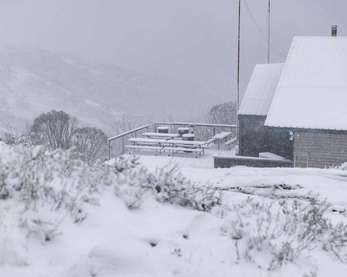 Wild autumn weather delivers snow, storms and power cuts to eastern Australia