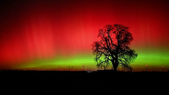 Northern lights shine in the night sky over Germany