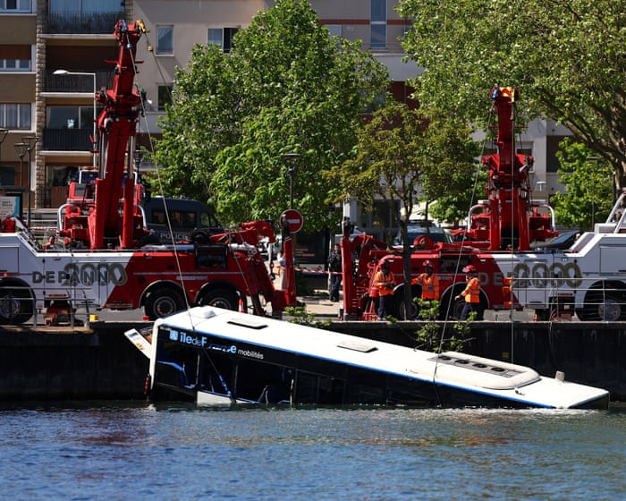 Four rescued from Seine after bus plunges into river near Paris