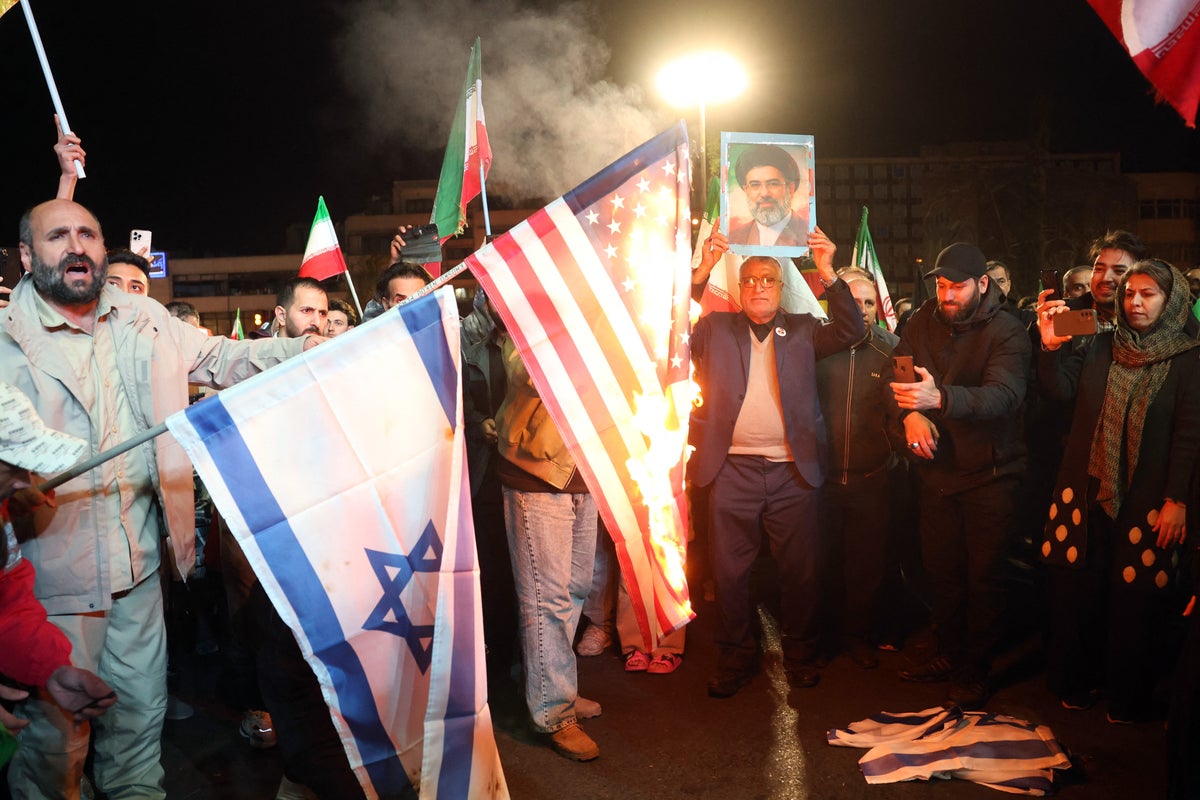 Iran-US war latest: Iranians burn American and Israeli flags after Trump declares ceasefire and re-opening of Strait of Hormuz