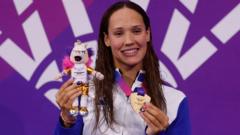 Evans steps out of shadows into spotlight with Scotland's fourth gold