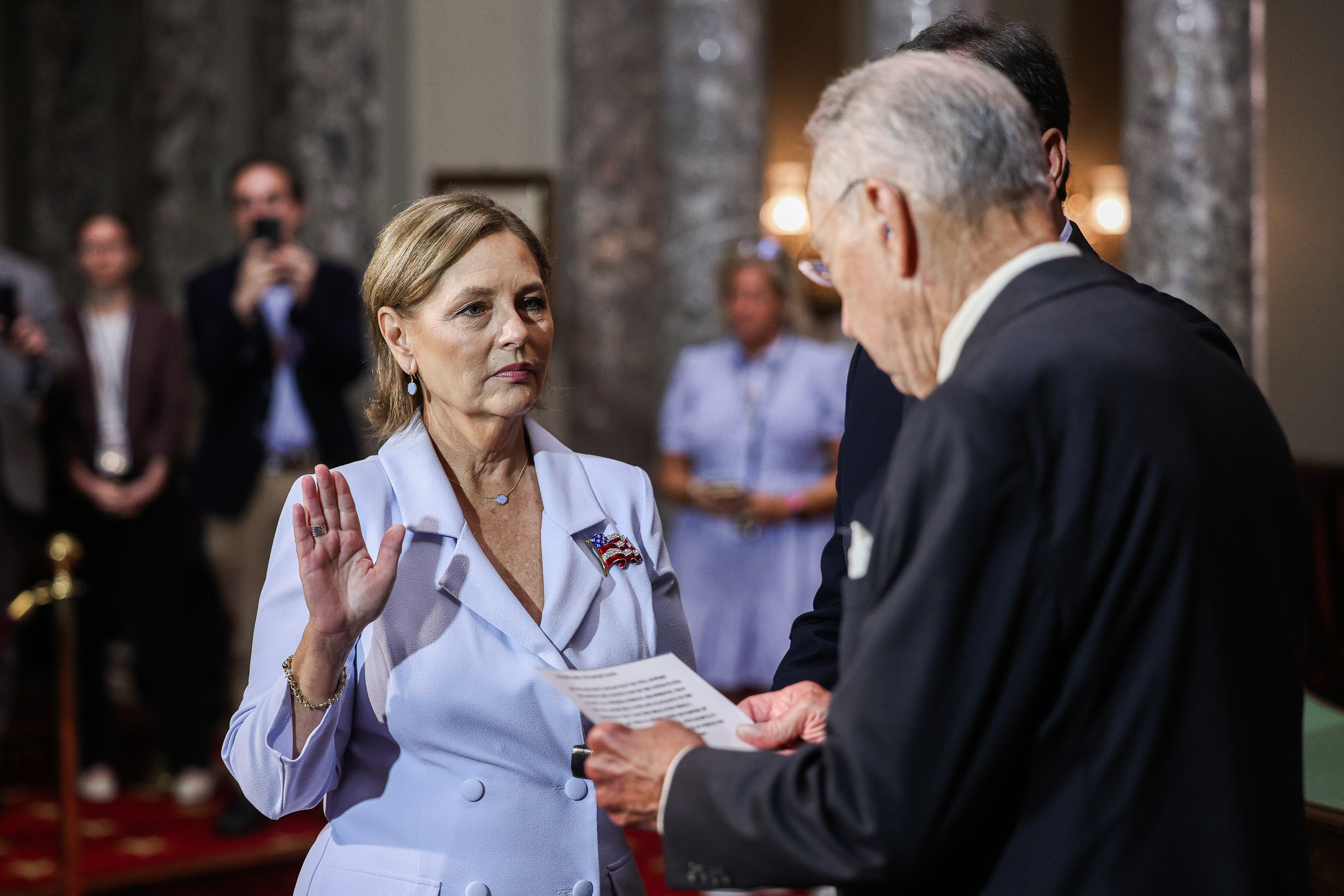 Darline Graham is sworn in to her brother's Senate seat