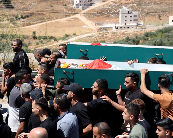 ‘Israeli settlers are in partnership with the army,’ say Palestinians after two shot dead in West Bank