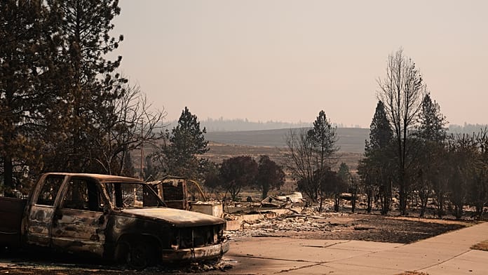 Smoke towers above Washington forests as firefighting continues