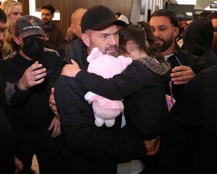 Three women face charges after IS-linked family members land in Australia