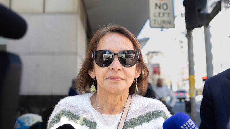 Accused killer cop’s mother charged with perverting justice