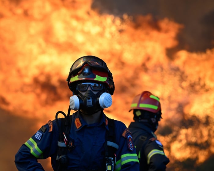 Two helicopters collide outside Athens as Greece battles to control wildfires