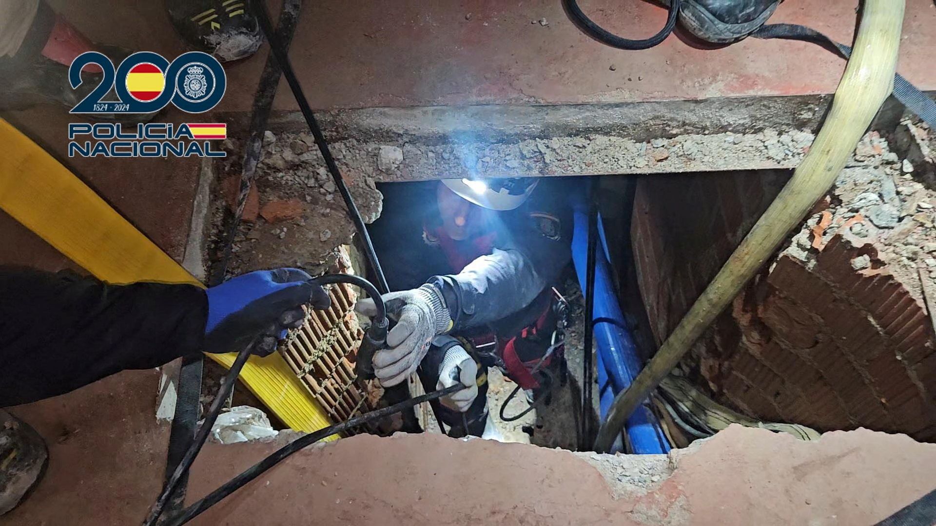 Drug-smuggling tunnel with rail system and underground crane discovered