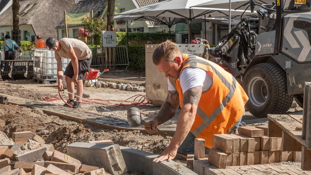 In beeld: genieten, ploeteren en verkoeling zoeken op deze tropische dag