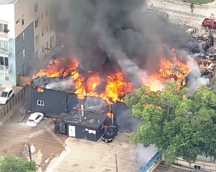 Dallas rescuers search for victims after gas explosion destroys building and ignites blaze