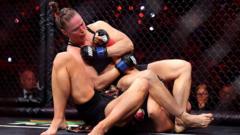 Rousey seals perfect ending with 15-second comeback win