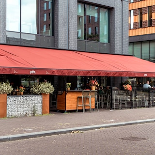 Spaans restaurant onder woontoren op Zuidas mag blijven grillen, vve levert onvoldoende bewijs voor brandonveiligheid